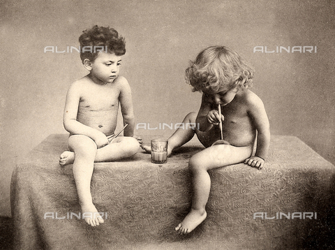 Two nude children play with soap bubbles Bovi MicheleRosenberg Sellier 